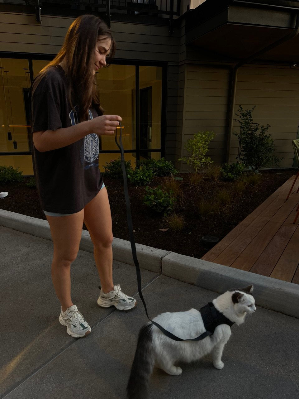 Pet parent with their pet wearing HomeyTag